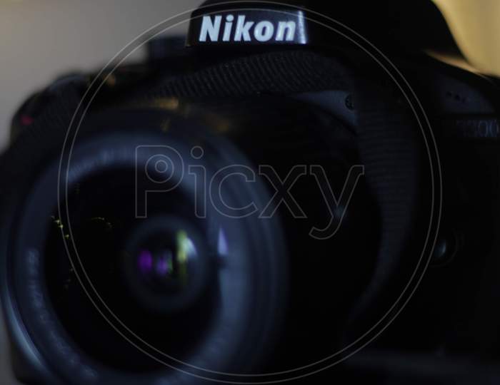 Nikon DSLR Camera With Led Light Bokeh Background