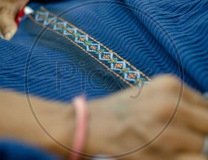 Clothes Or Textiles With Embroidery Design Closeup