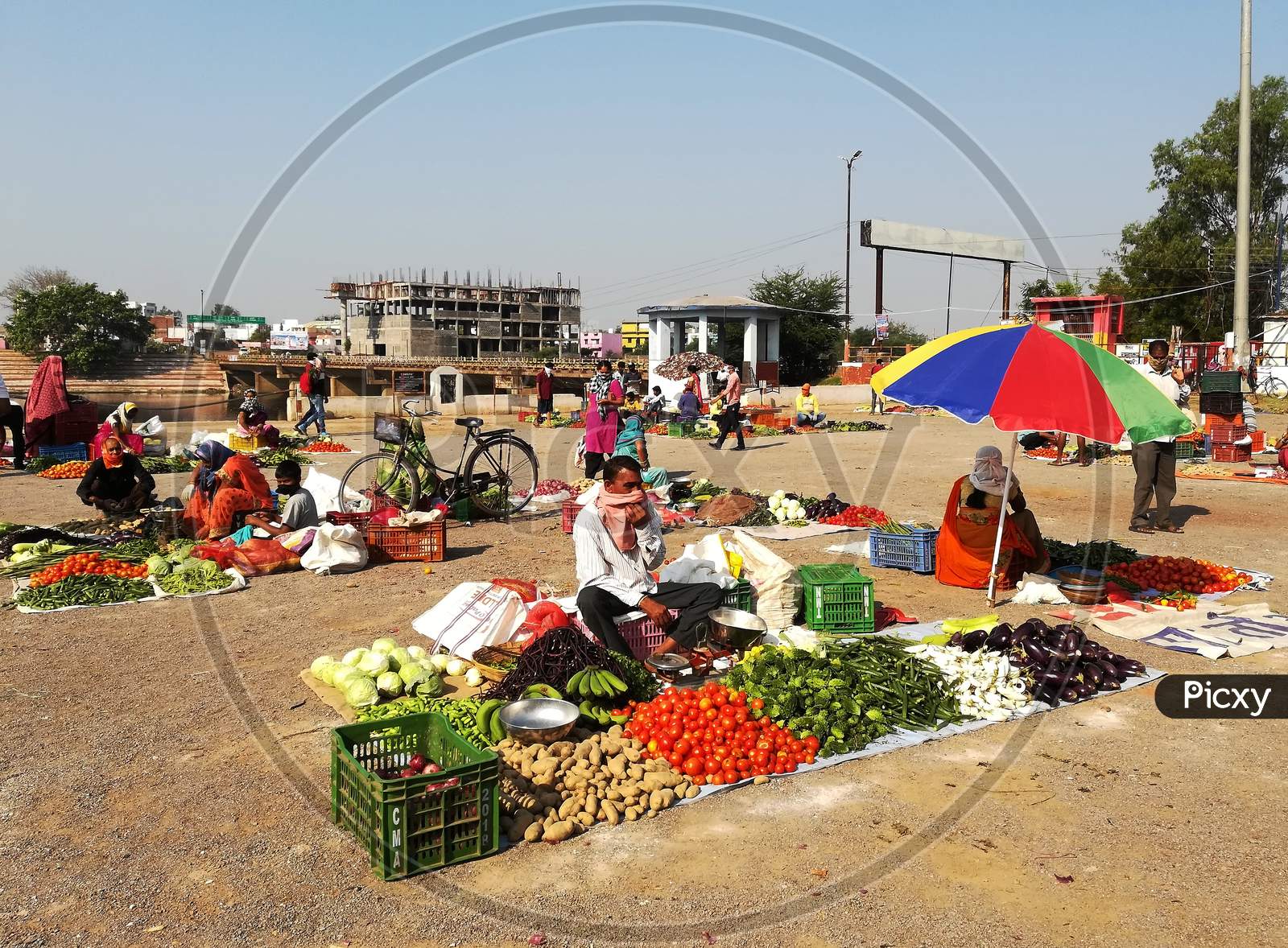 Social distancing maintained by fresh vegetable seller during corona virus spread