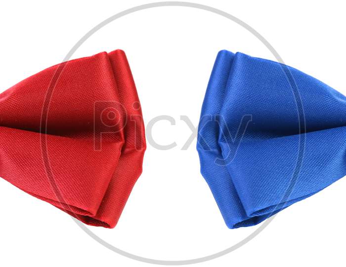 Half Of Red And Blue Bow Tie. Isolated On A White Background.