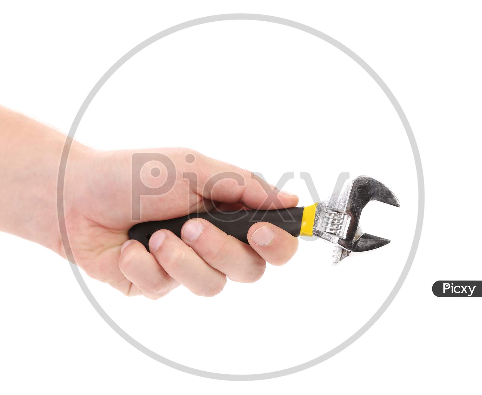 Hand Holding Adjustable Wrench. Isolated On A White Background.