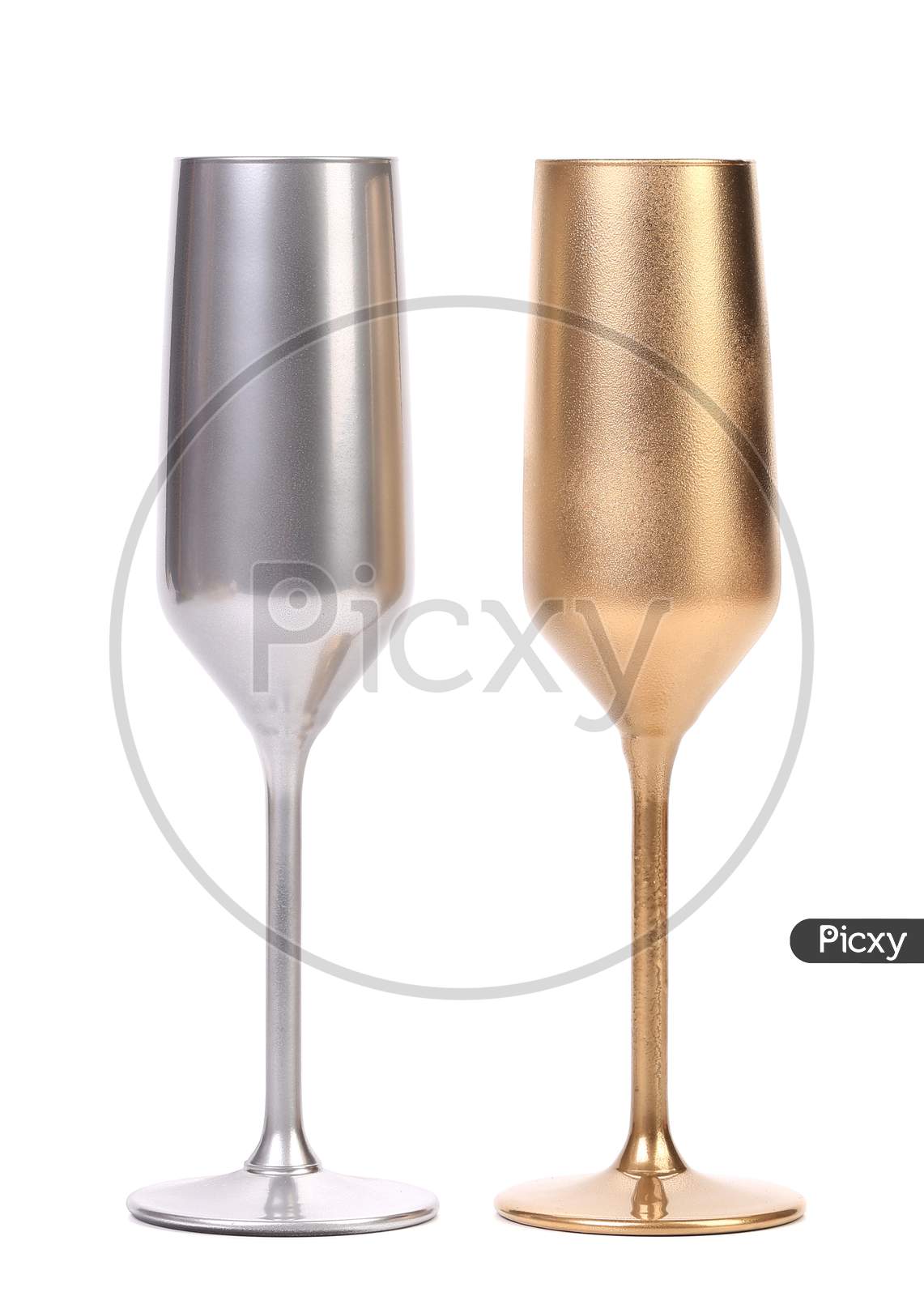 Golden And Silver Champagne Glasses. Isolated On A White Background.