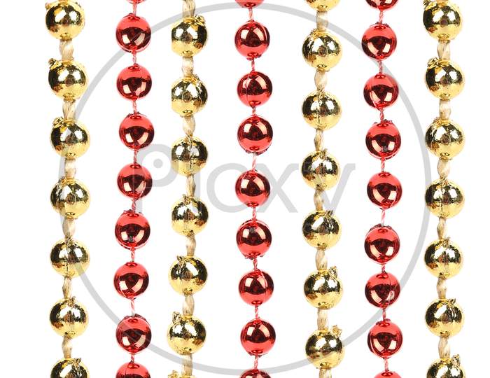 Strings Of Golden And Red Beads. Whole Background.