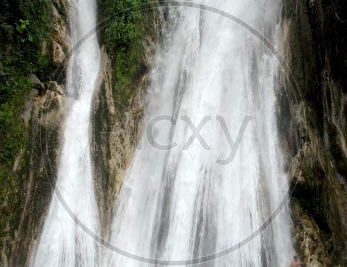Long Exposure Of A Waterfalls With Smooth Sliky Texture Of Water flowing