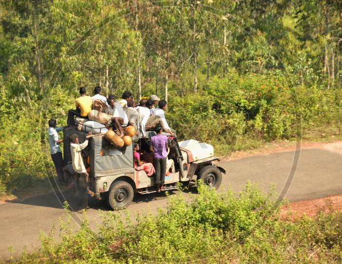 People Of Araku Commuting by Jeeps On Terrains Roads