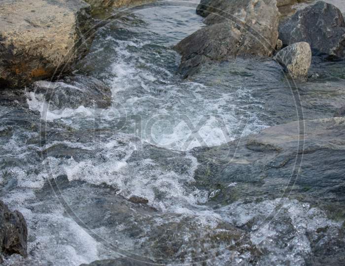 Long Exposure Shot Of White Water Flowing Downhill
