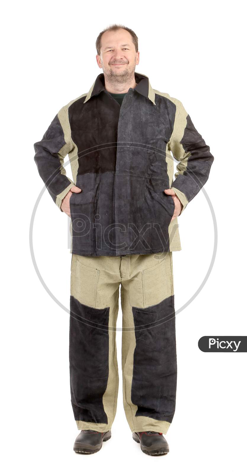 Welder In Workwear Suit. Isolated On A White Background.