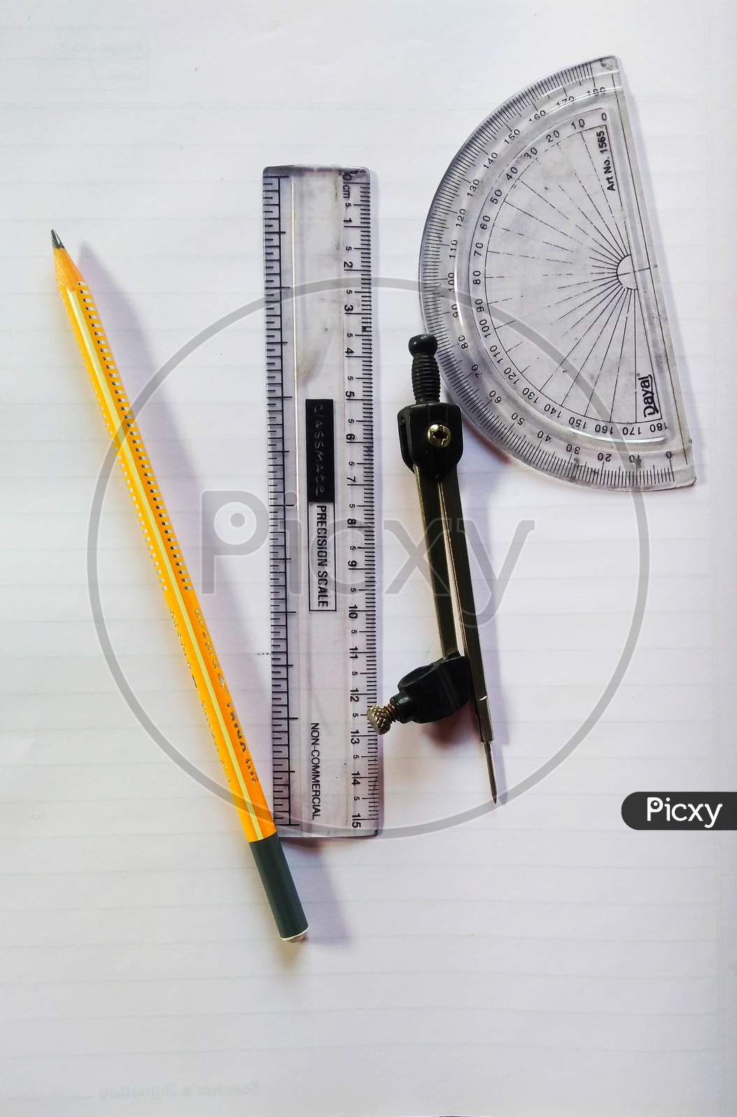 Geometrical instrument with ruler, pencil, metallic compass