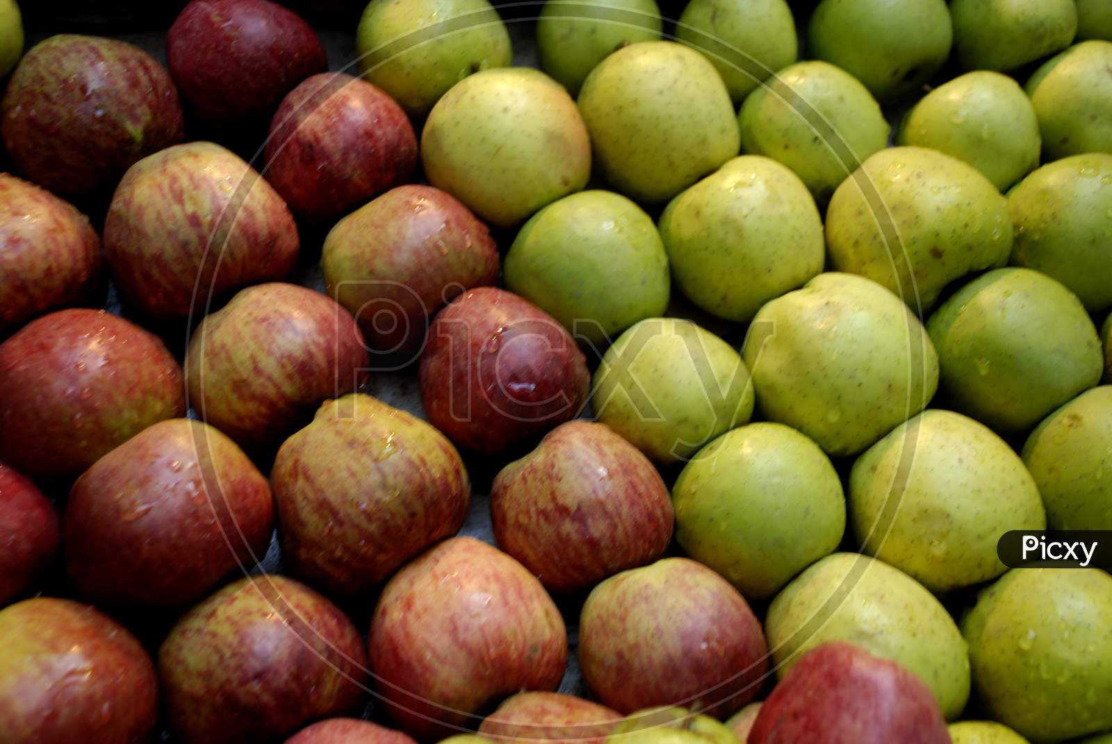 Apples Closeup In an Vendor Stall Forming a Background