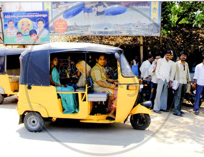 A Woman Riding Auto Rickshaw in India, Woman Empowerment