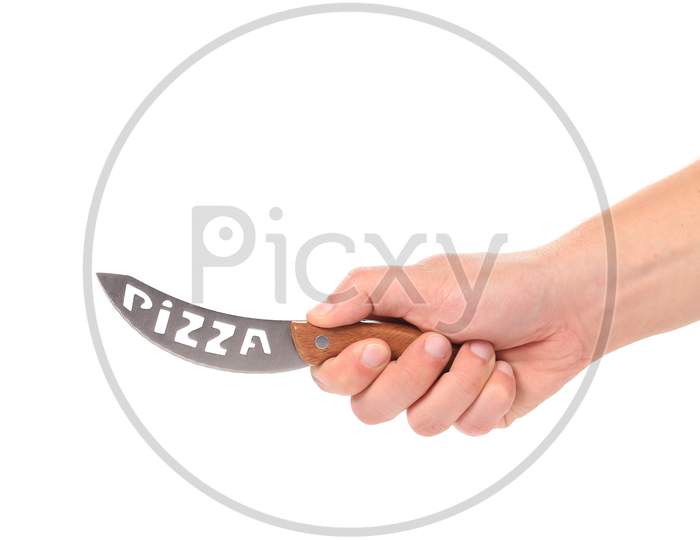 Hand Holds Pizza'S Knife. Isolated On A White Background.