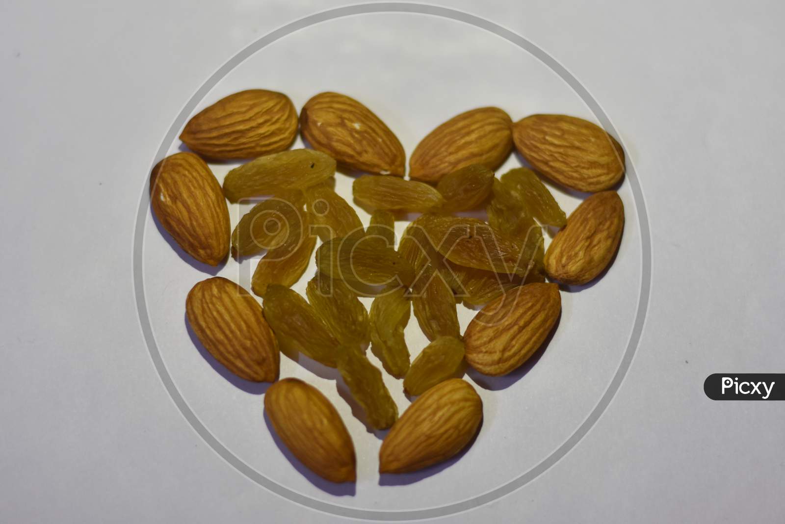 almonds hearts on a white background