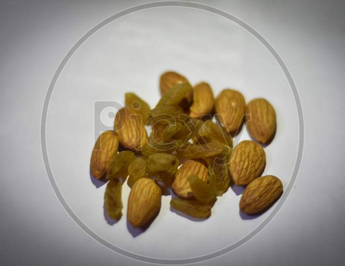closeup of a almonds and almonds on a white background