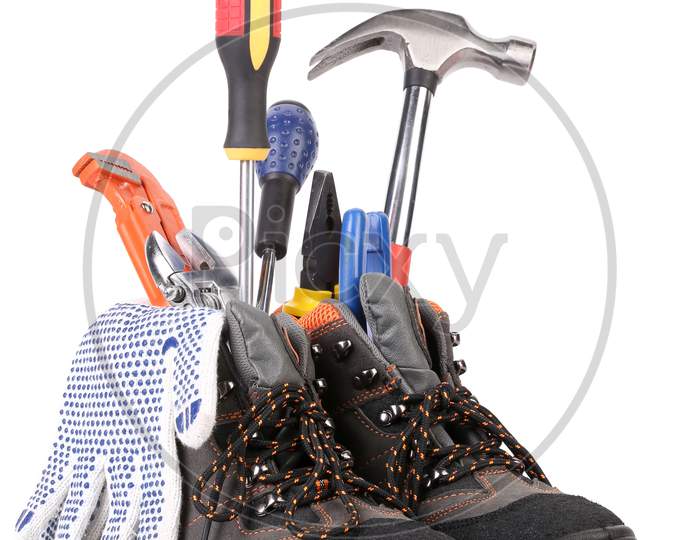 Building Tools And Boots Composition. Isolated On A White Background.