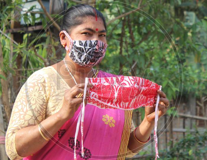 Women Make Protective Facemasks to Be Distributed Later In Wake Of The Coronavirus Crisis at Dodora In Kamrup District Of Assam