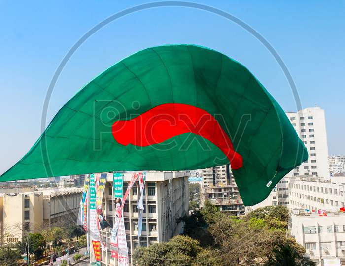 Bangladeshi Flag Waving In Sky At Dhaka, Bangladesh.
