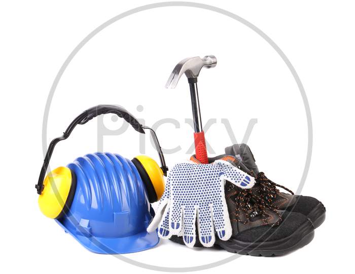 Various Tools And Boots. Isolated On A White Background.