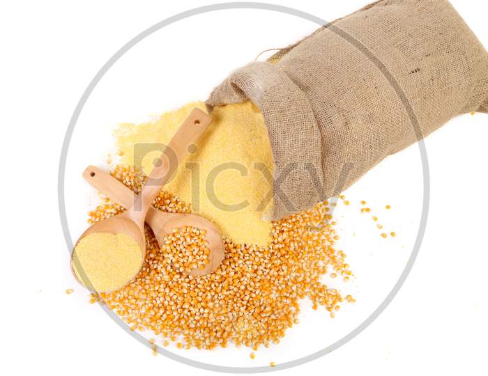 Sack With Corn Grains And Flour. Isolated On A White Background.