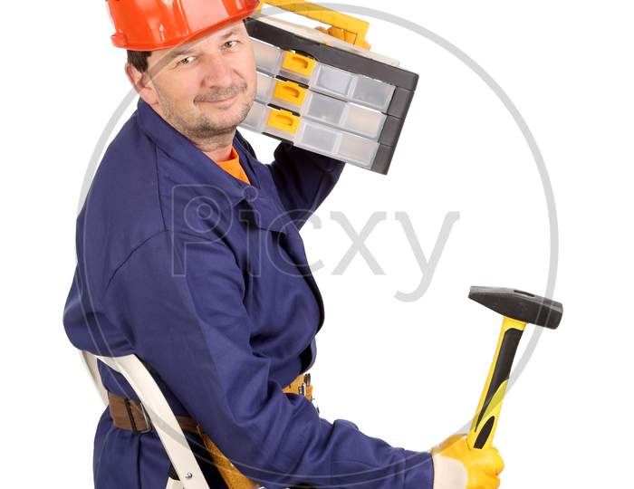 Worker On Ladder With Hammer And Toolbox. Isolated On A White Background.