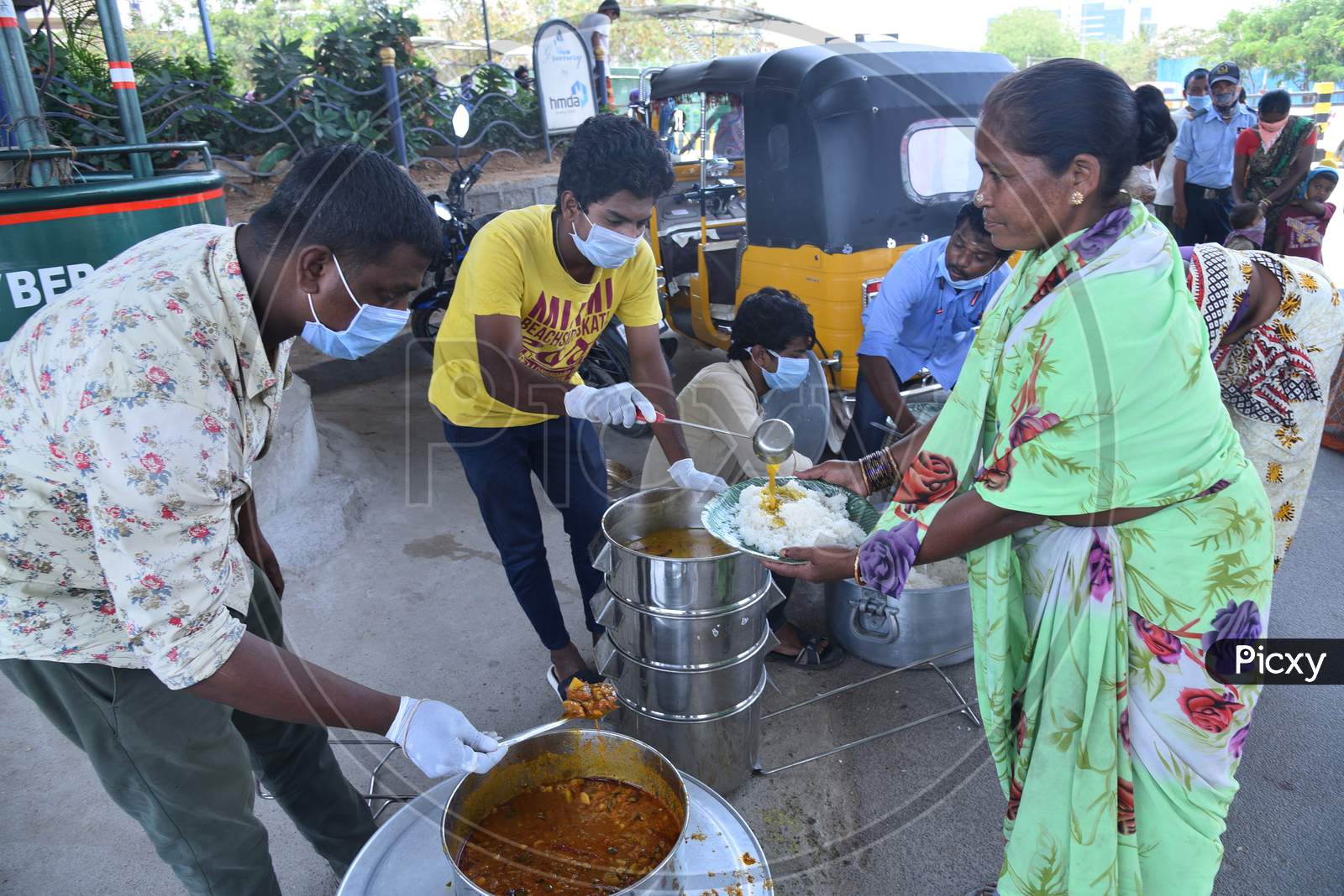 Free food distribution by individual donors to the Migrant workers living around Madhapur amid nationwide lockdown due to coronavirus pandemic, April 10,2020, Covid19