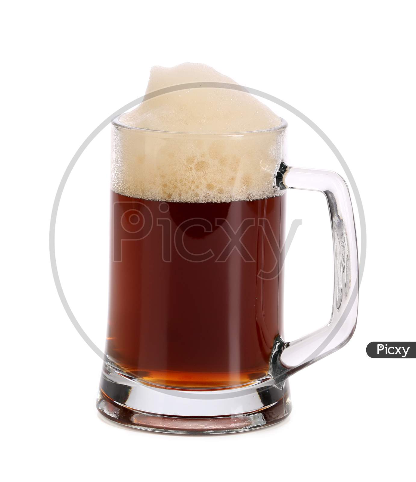 Closeup Of Mug Full With Brown Beer. Isolated On A White Background.