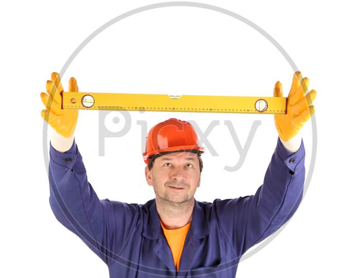Worker In Hardhat With Measure Ruler. Isolated On A White Background.