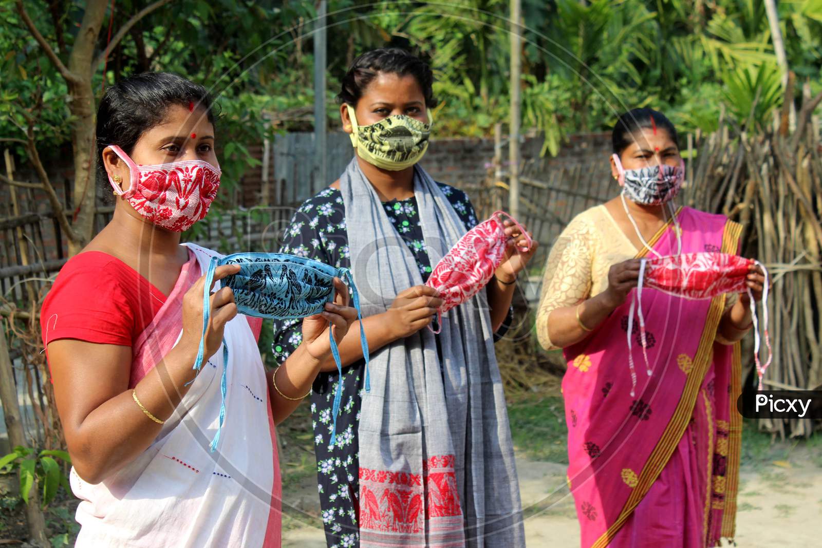 Women Make Protective Facemasks to Be Distributed Later In Wake Of The Coronavirus Crisis at Dodora In Kamrup District Of Assam