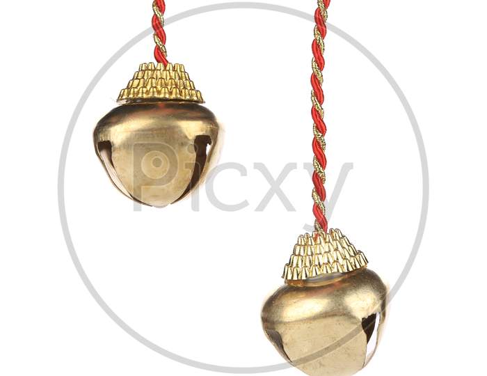 Golden Jingle Bells On A Rope. Isolated On A White Background.