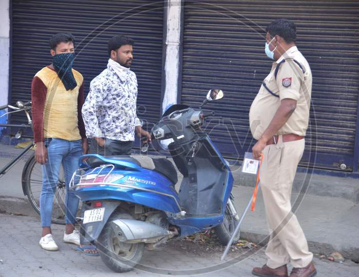Police Personnel Stop Commuters For Flouting Lockdown Norms Amid The Coronavirus Outbreak In Nagaon District Of Assam  On April 10,2020 