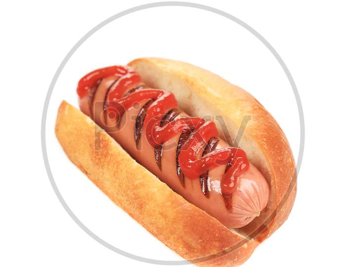 Hotdog With Mustard And Ketchup. Isolated On A White Background.