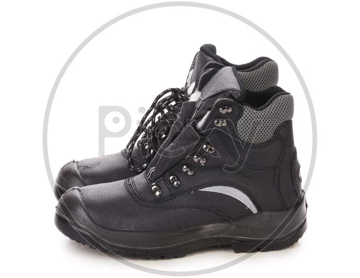 Black Man'S Boots With Gray Bar. Isolated On A White Background.