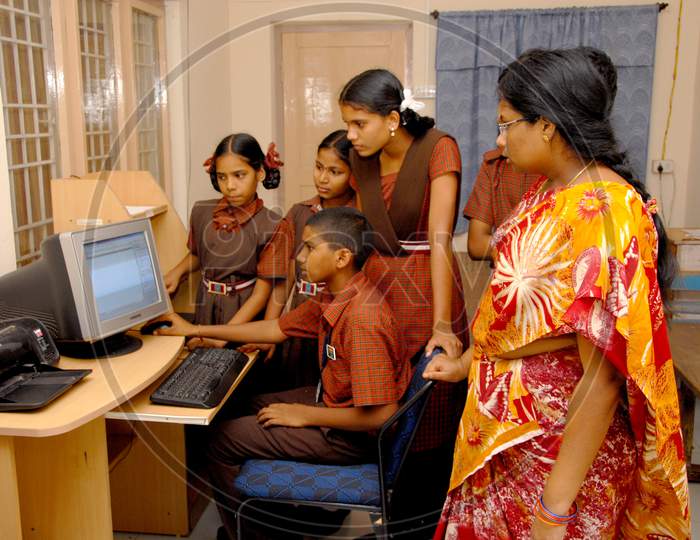 School Children Learning Computers in an Digital Class