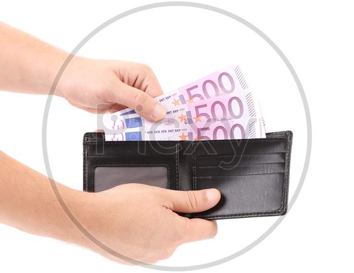 Hand Taking Out Euro Bills From Purse. Isolated On A White Background.