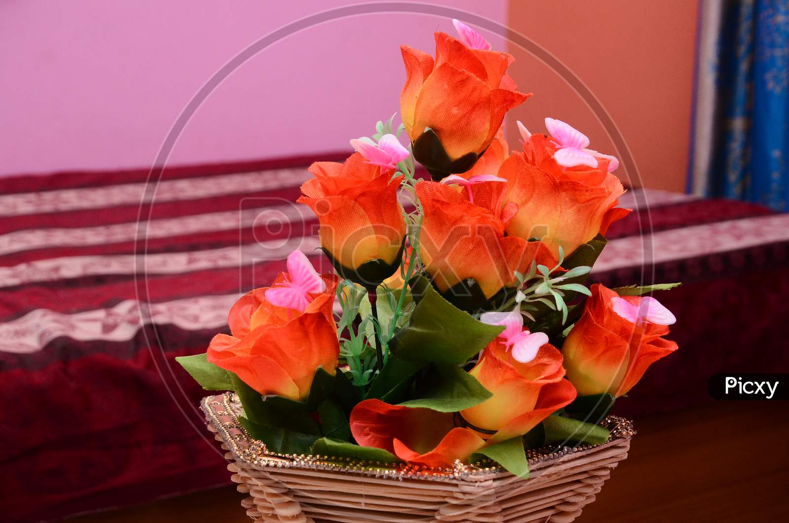 Beautiful artificial flowers plant in home