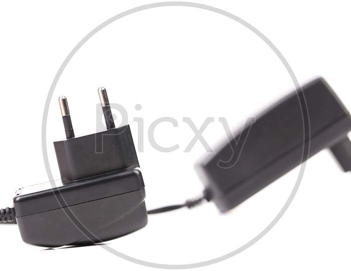 Two Electric Power Adapters. Close Up. Isolated On A White Background.