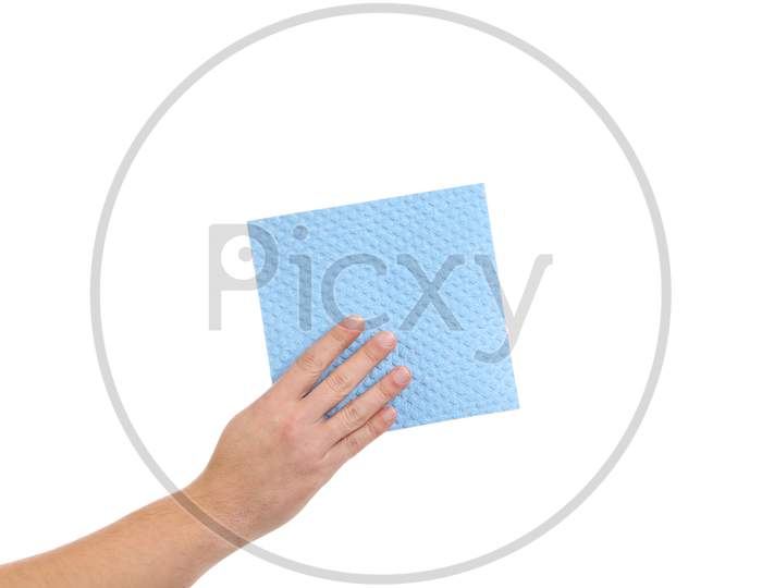 Hand Holds Blue Cleaning Sponge. Isolated On A White Background.