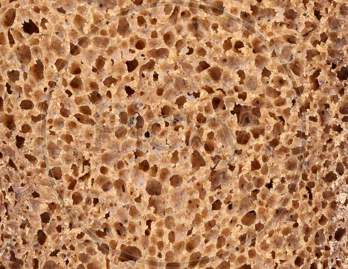 Brown Bread Slice. Close Up. Whole Background.