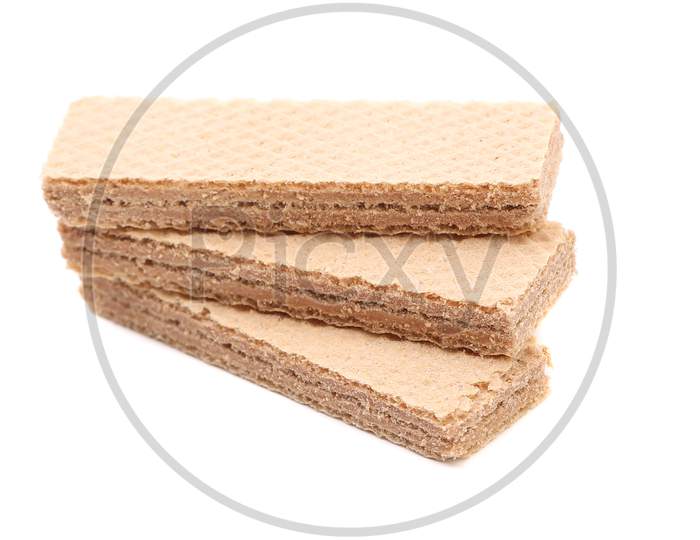 Stack Of Three Chocolate Wafers. Isolated On A White Background.