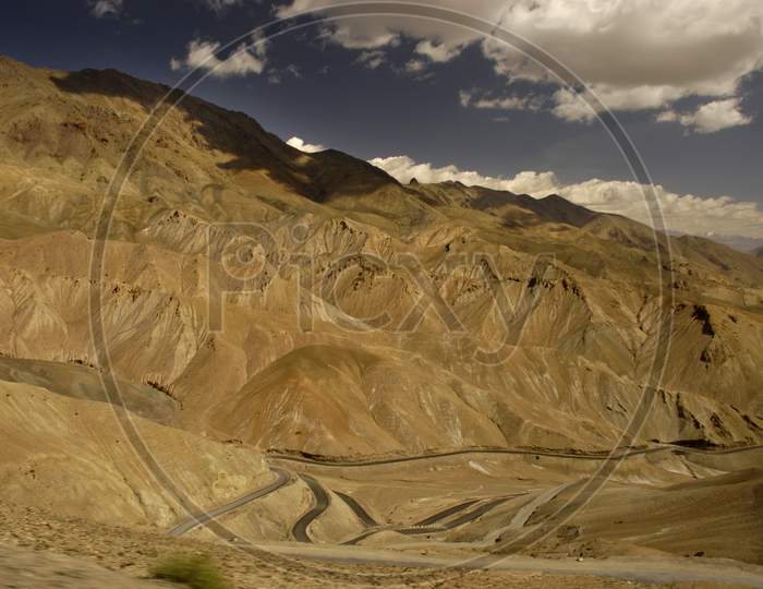 Mountains In Ladakh With Blue Sky As Background