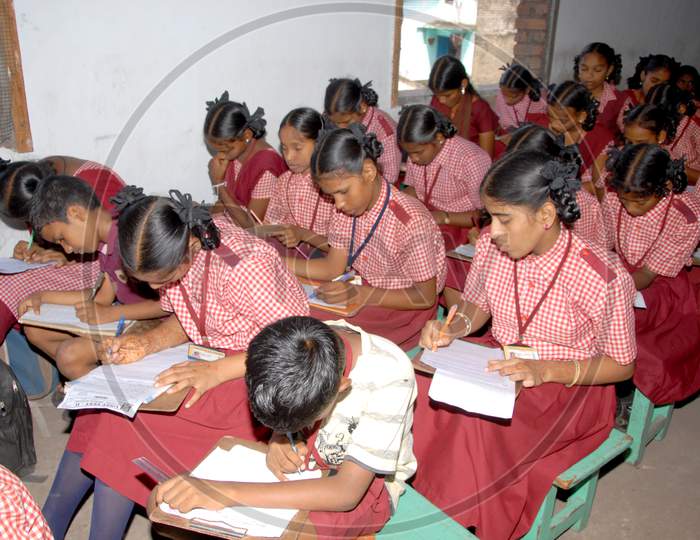 Indian School Children  Reading In an Classroom