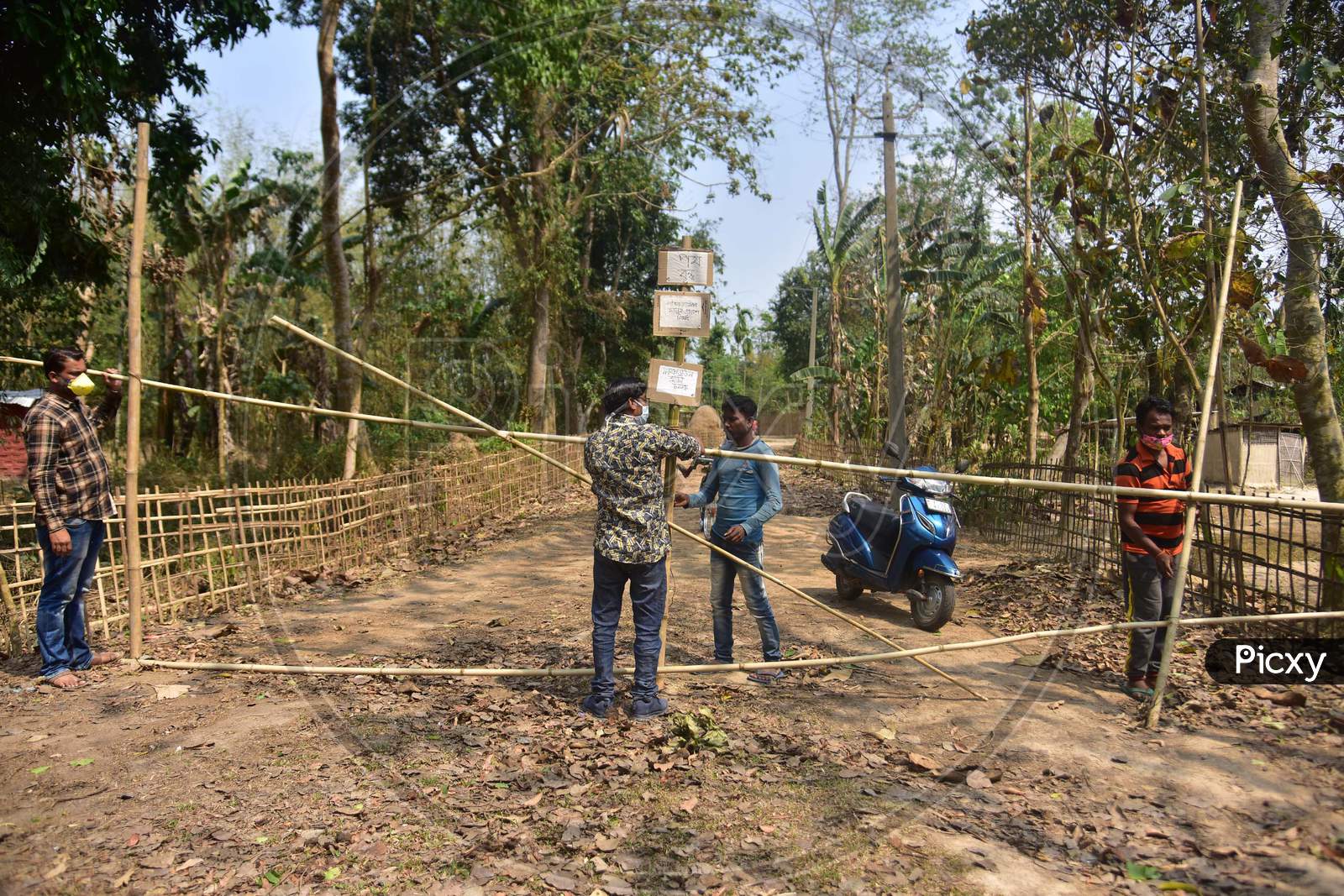 Barricade Made Of Bamboo Is Laid Across A Road By Residents During A 21-Day Nationwide Lockdown To Limit The Spreading Of Coronavirus Disease (Covid-19), At A Village In Nagaon District Of Assam