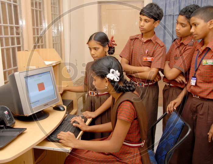 School Children Learning Computers in an Digital Class