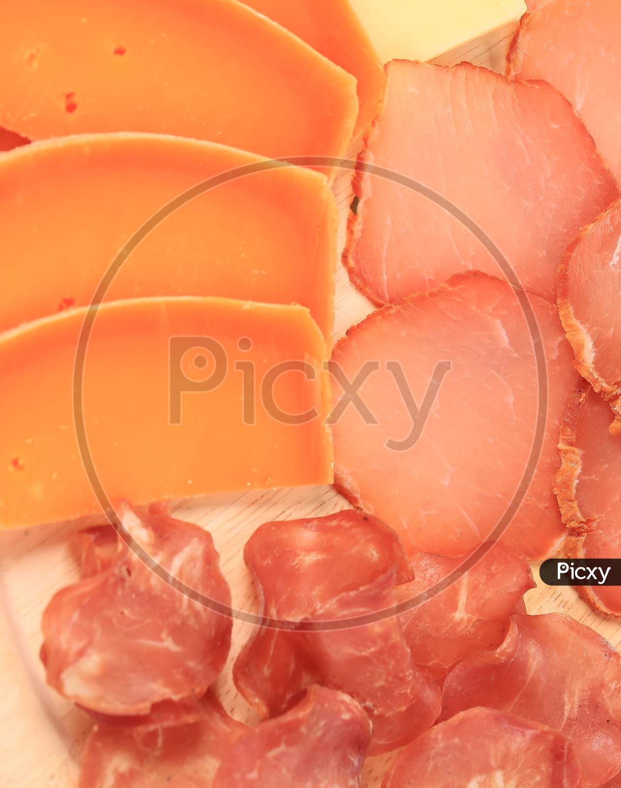 Various Meat Slices And Parsley. Whole Background.