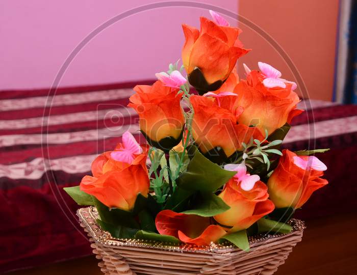 Beautiful artificial flowers plant in home