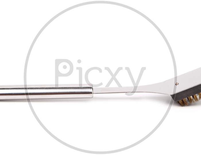 Close Up Of Bbq Grill Brush. Isolated On A White Background.