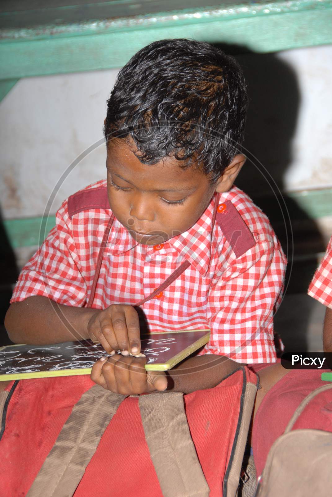 Indian School Kids Reading In an Classroom