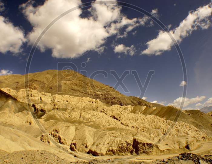 Sand Terrains Or Mountains With Blue Sky Composition In Ladakh
