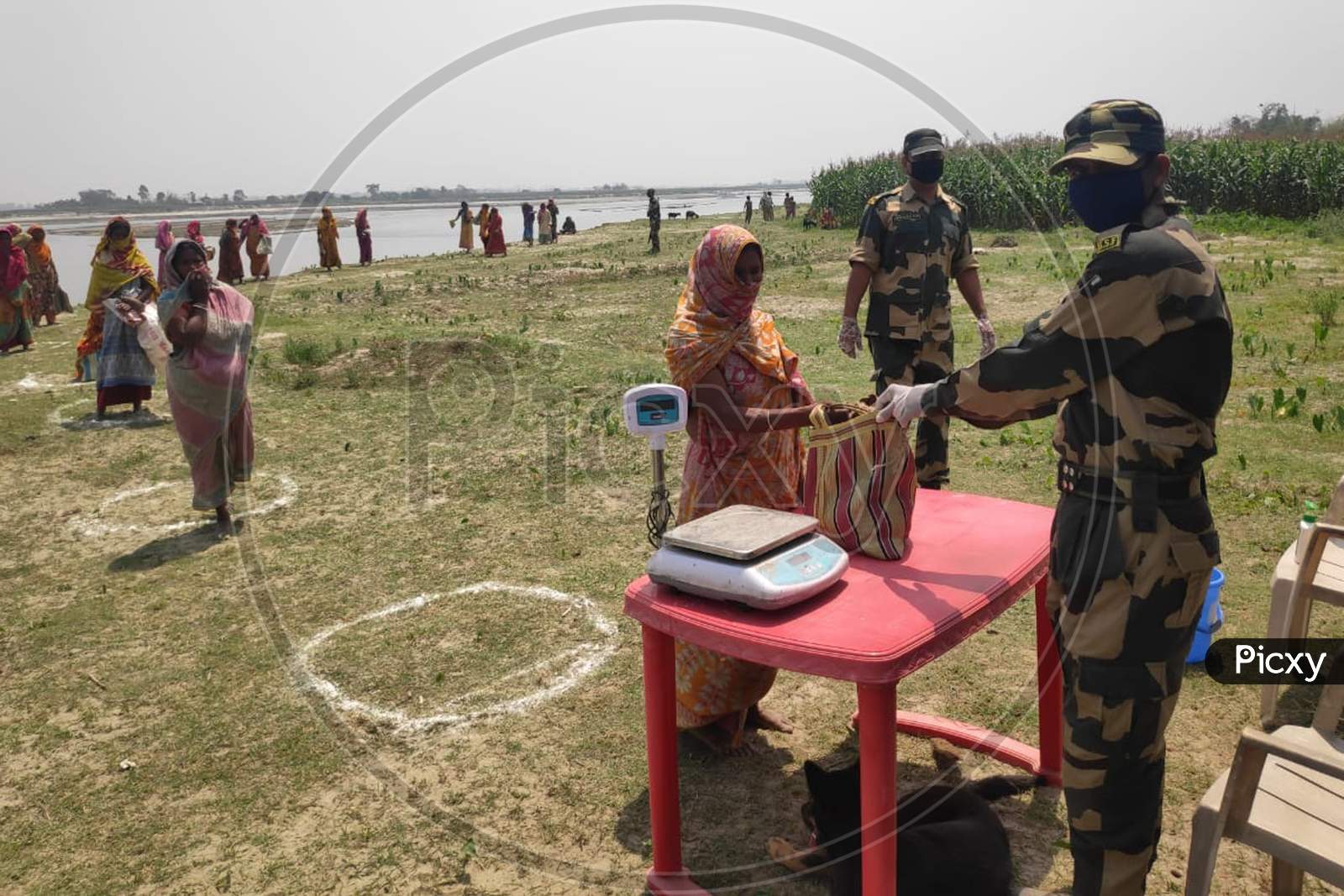 Border Security Forces Guwahati Frontier Distribute Ration To Needy People Of Border Village Joradharla in West Bengal''s Coochbehar district,  On April 11,2020.