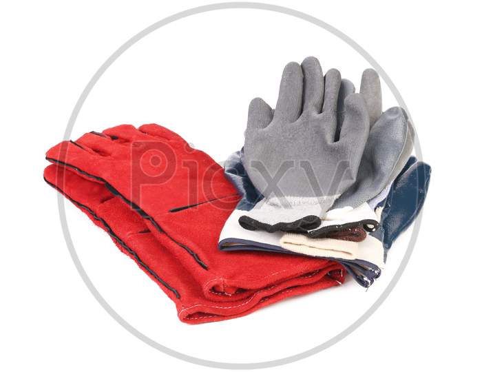 Leather And Rubber Gloves. Isolated On A White Background.
