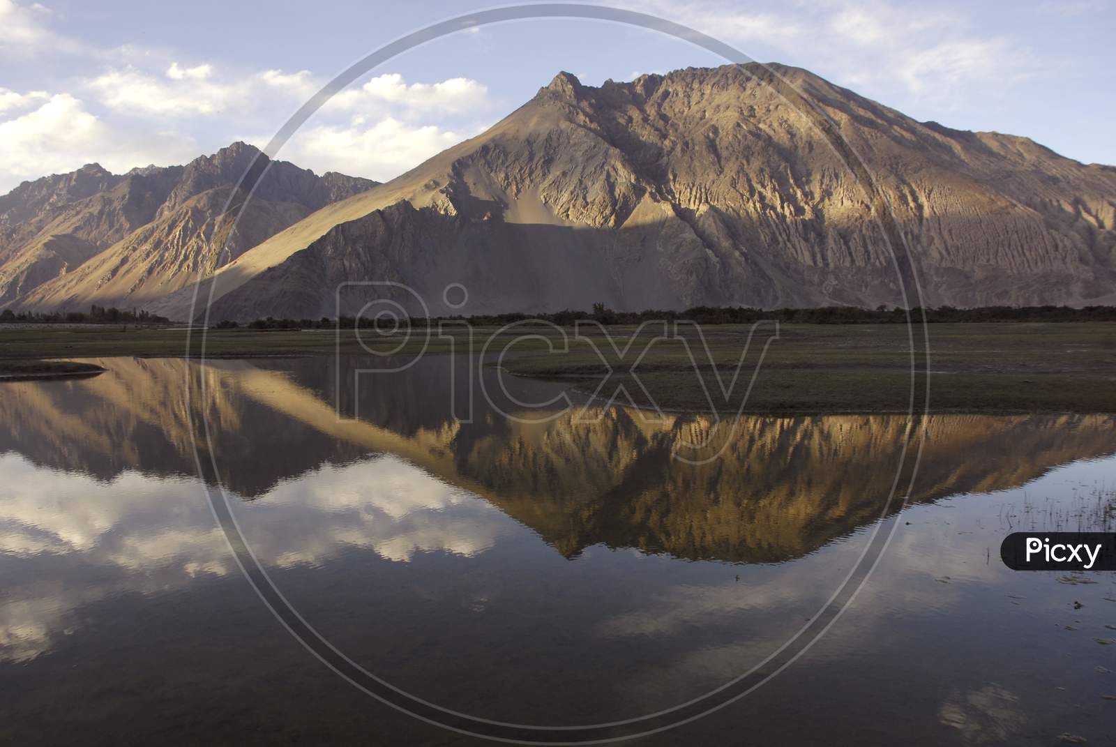 Lake In Ladakh With Mountains And Its reflection  on Water Surface